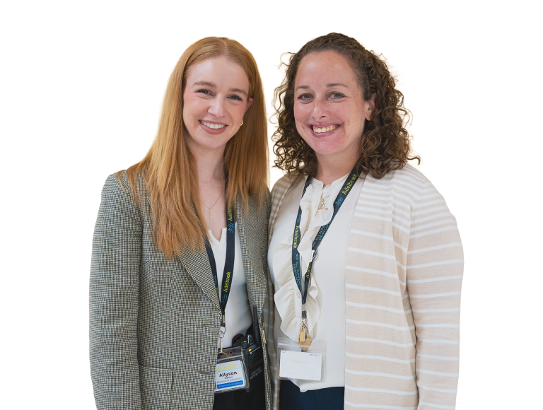 Two women smiling