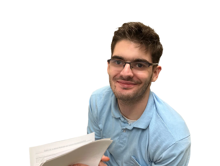 Young man with glasses smiling