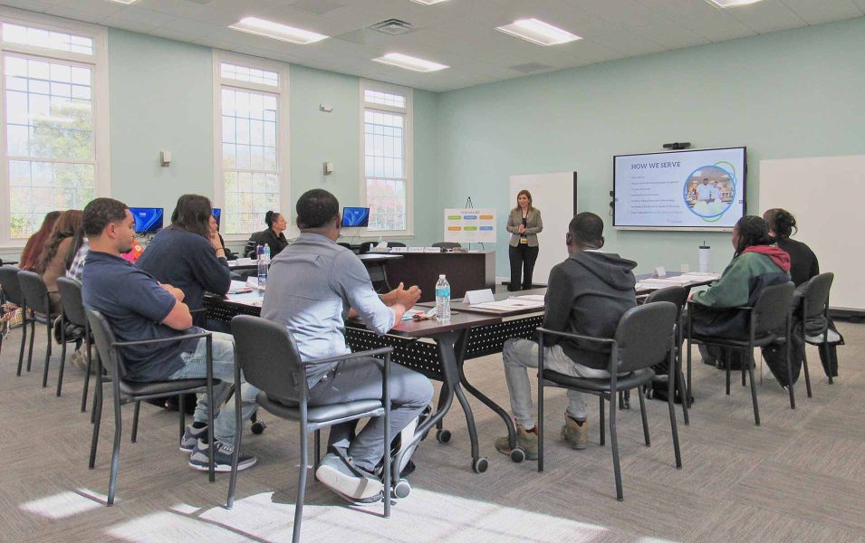Adelbrook conducting a consultation presentation to a group of people 